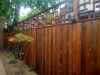 recycled fence rebuilding with custom lattice and stain