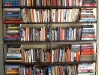 welded steel bookshelf frame with black stained wood shelving