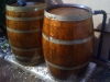 stained wine barrels converted to rain barrel system